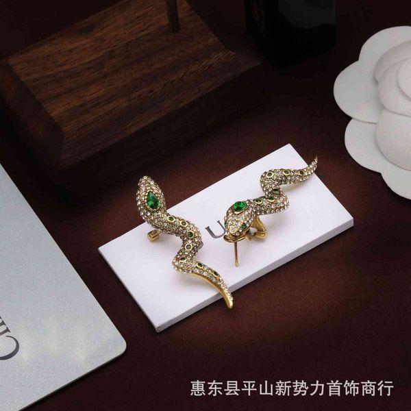 

gjia / gujia 21 year new snake earrings for women's doubles, Golden