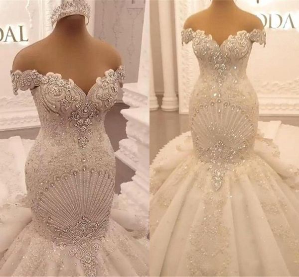 

luxury appliques lace mermaid wedding dresses 2022 princess off shoulder crystal backless ruffles cathedral train arabic dubai bridal gown, White