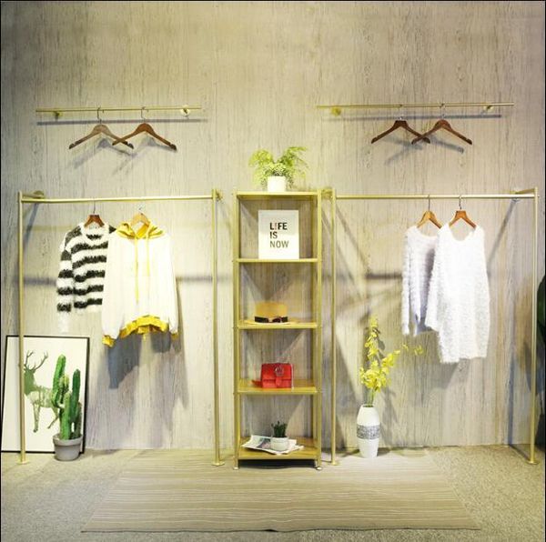 

gold clothing store display rack children's wall hanging women's shelves hangers & racks