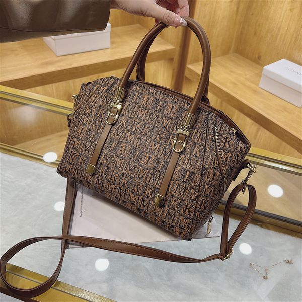 

wholesale factory ladies leathers bags hong kong style retro printed handbag elegant atmosphere letter backpack large capacity joker contras, Black;red