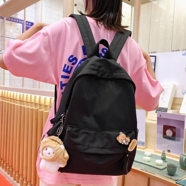 

school bags solid color women backpack cute schoolbags for teenager girls with pendant nylon waterproof travel bagpack 2021 mochilas