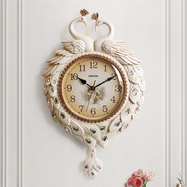 

wall clocks tuda european style peacock living room large silent swing clock bedroom atmosphere stylish pointer quartz pendulum