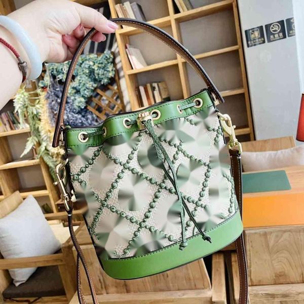 

factory outlet luxury handbags and storage outlet tb tangli bucket color avocado green one shoulder messenger bag designerss