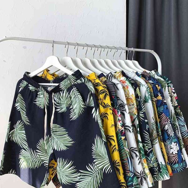 

2021 summer korean beach pants men's youth casual large floral shorts