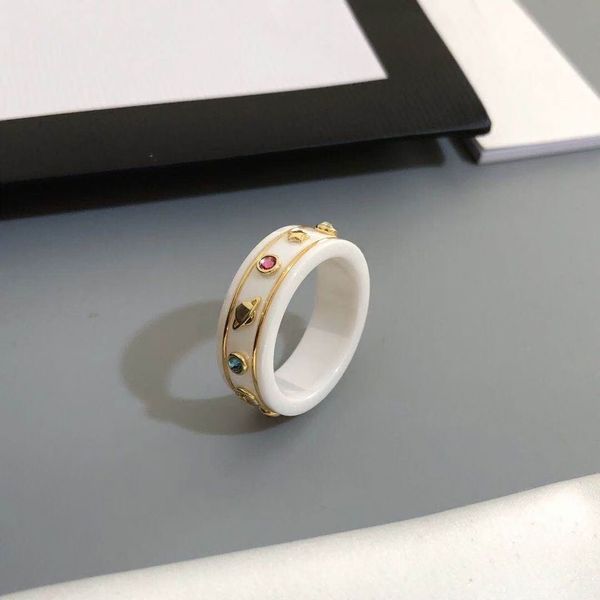 

2021 new jewelry double ceramic black and white letter element bee planet couple ring, Silver
