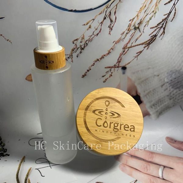 

storage bottles & jars wholesale custom logo frosted glass cream jar skin care packaging with bamboo lid for cosmetics body containers