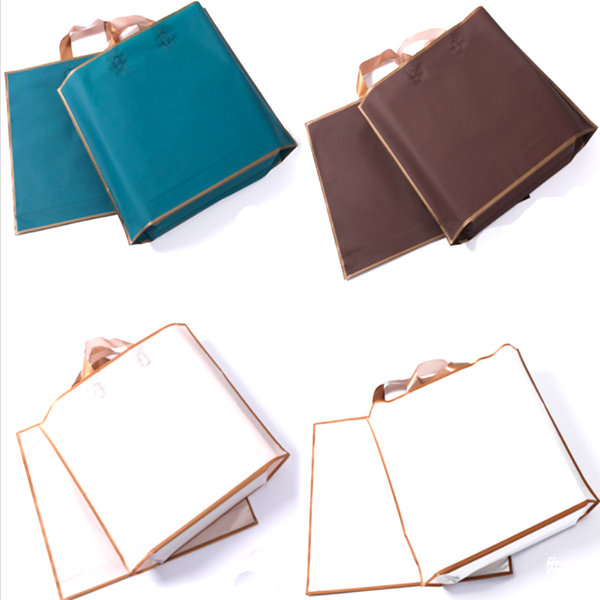 

gift wrap 50pcs/lot plastic bags with handle wedding gifts package shopping packaging