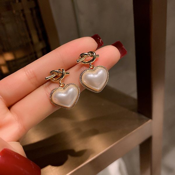 

925 silver needle love pearl earrings love winding knot earrings simple personality ear jewelry, Golden;silver