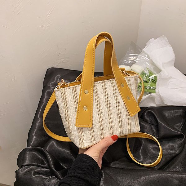 

new handbags straw contrast color women's 2021 korean small fresh single shoulder messenger bag mini portable bucket factory direct sal