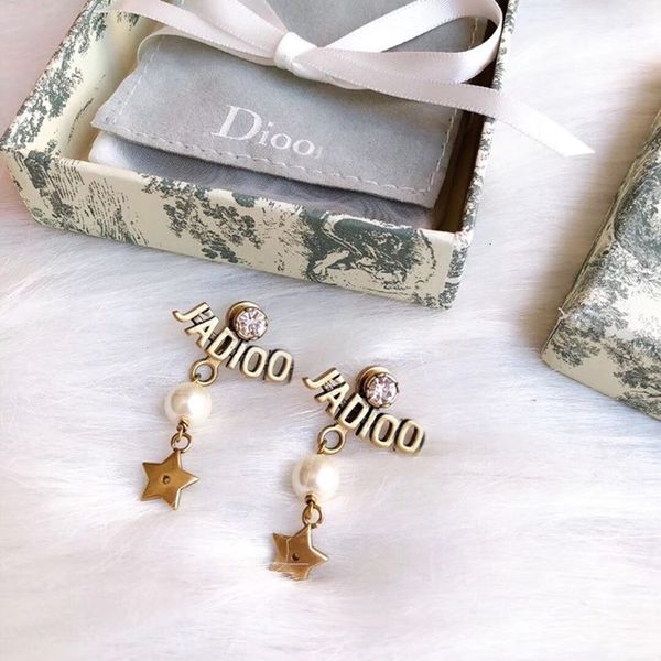 

d family / di new star letter pearl earrings female same high version brass tassel, Golden