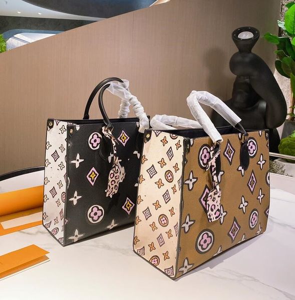 

2021 women fashion graffiti quirky designer bag full leather handbag tote big double-sided printing ability two colors optional