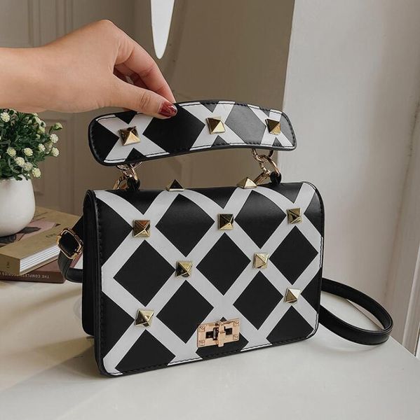 

factory wholesale women chain bags street personalized rivet punk handbags european and american popular plaid handbag shaped leather messen