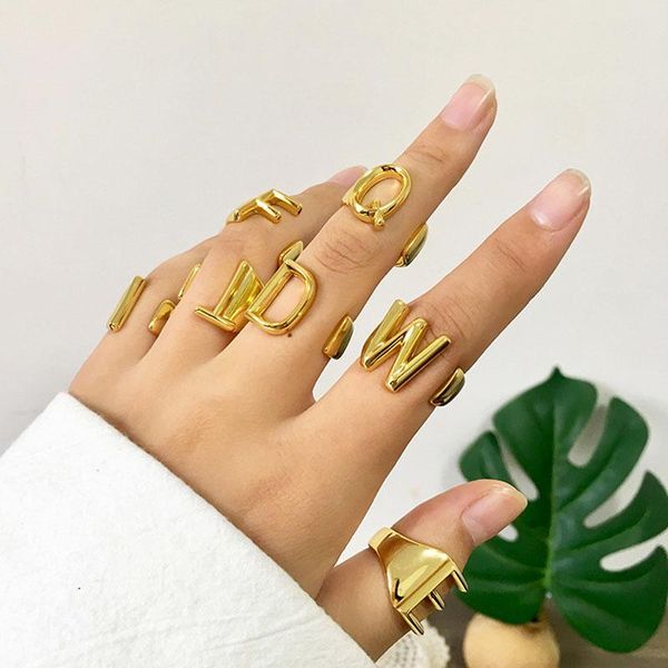

cluster rings japan korea 2021 wholesale female and male ring 26 english letter open loop luxury gift stainless steel, Golden;silver