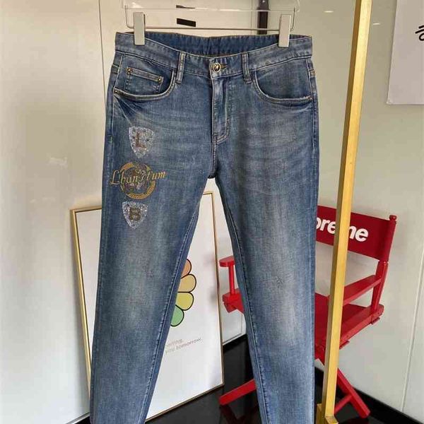 

[2021 spring / summer new] italian niulamber small foot light blue jeans with heavy process stamping printing