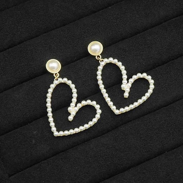 

70% off new pearl love net red same earrings 925 silver needle female