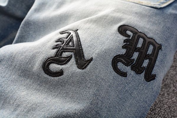 

brand pants and jeans shorts designer fashion blue mens slim skinny casual fluff folds holes motorcycle pants ripped den