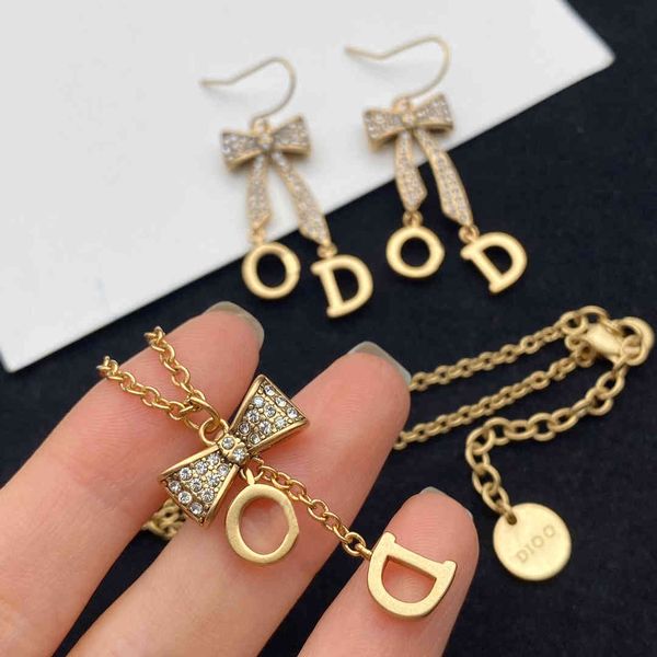 

aaa designer jewelry bow diamond clavicle necklace earrings high version brass set, Silver