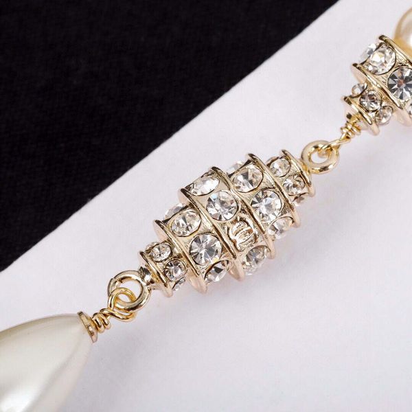 

famous stamp drop earring with pearl and diamond for women engagement ps3908, Golden