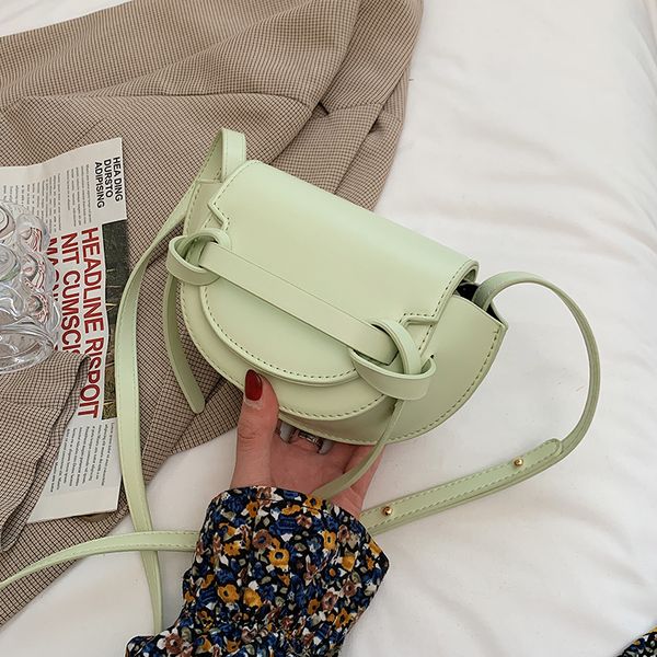 

solid color green pu leather small saddle crossbody bags for women 2021 summer travel fashion simple shoulder handbag and purse