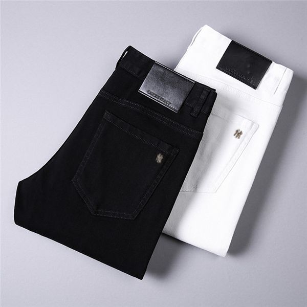 Jeans di lusso firmati da uomo di alta qualità Nero Bianco un paio venduti Pantaloni da uomo casual da lavoro in difficoltà Street Wear Pantaloni slim-gamba con bordi strappati Pantaloni famosi W40