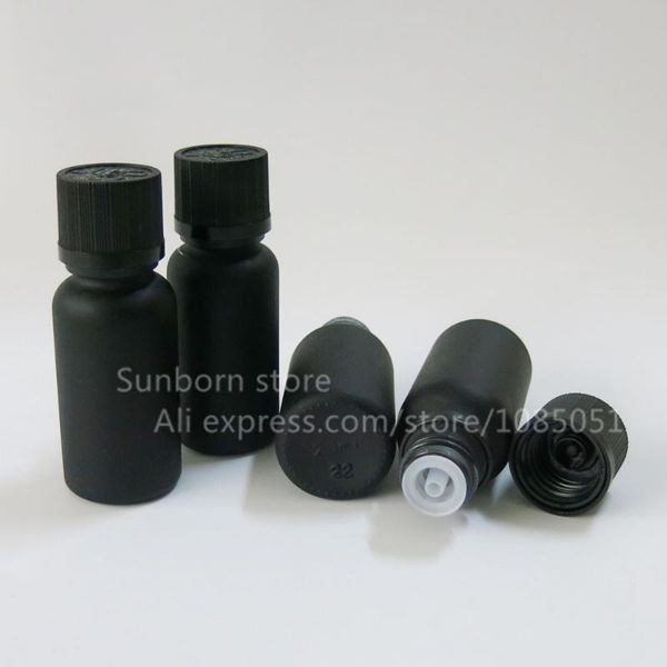

10pcs/lot 20ml black glass oil bottle with childproof screw cap and orifice reducer storage bottles & jars
