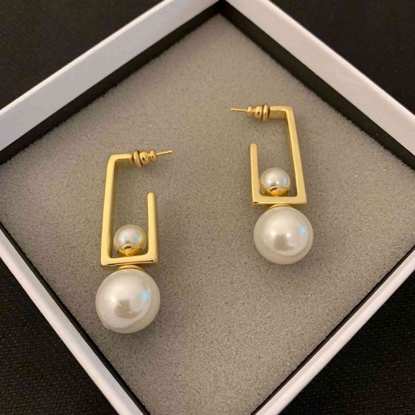 

2021 new designer family's pearl earrings in 2021, Golden