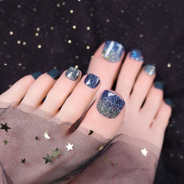 

manicure the tiktok is a type of toe stick., Red;gold