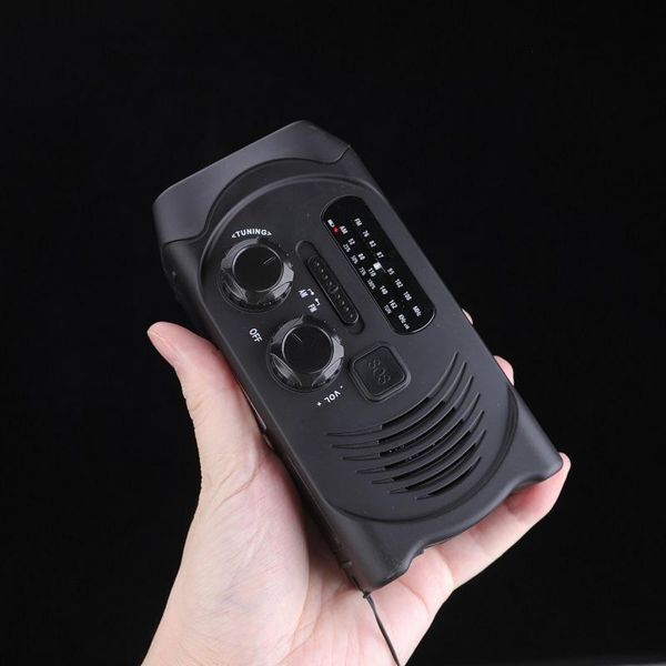 

portable lanterns hand power/solar power/rechargeable used as desk lamp/charging treasure/radio/alarm/weather forecast with scree