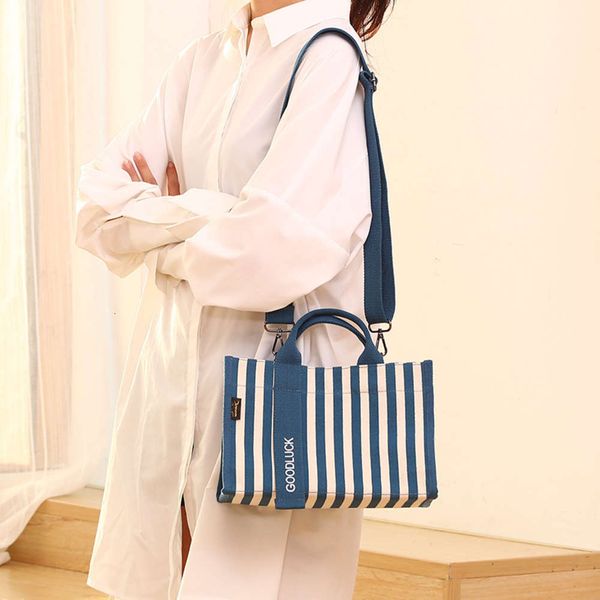 

spring and summer striped canvas women's bag blue white h one shoulder straddle