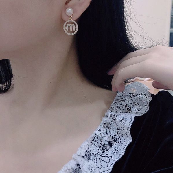 

pearl letter studded earrings for women's simple and generous net red miu earrings, Golden