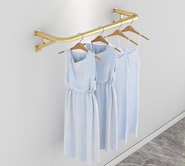 

hangers & racks wall mounted clothes rack on display of clothing store special women's wear for