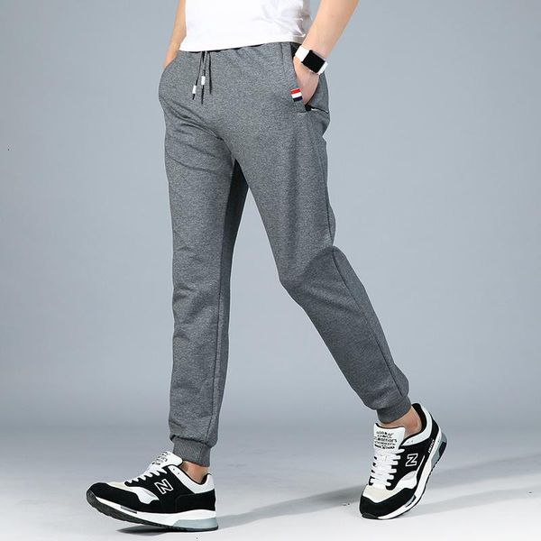 

men's pants uyuk2021 autumn youth trend waist loose elastic beam foot sweatpants cotton solid color casual joggers pantalon hombre, Black