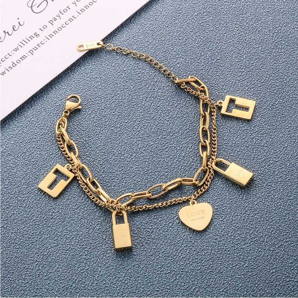 

316l stainless steel women's bracelet, high-end jewelry, heart-shaped multi-element lock, thick chain lock, Golden;silver
