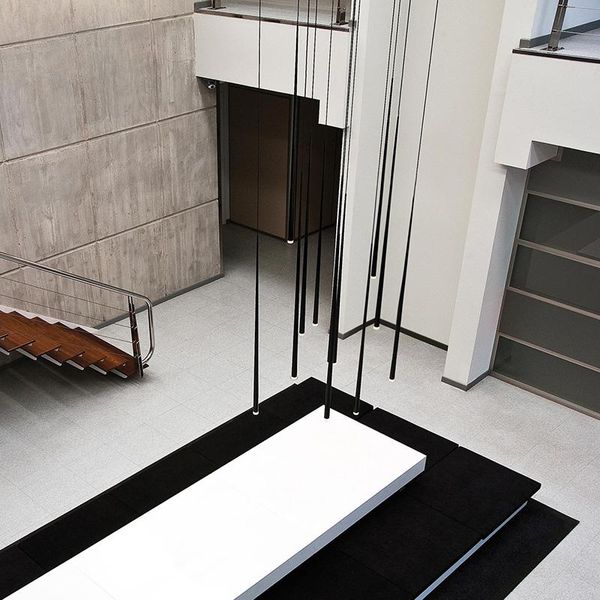 

pendant lamps post-modern stairwell hollow minimalist hanging lamp art restaurant bar creative long cylindrical cone chandelier