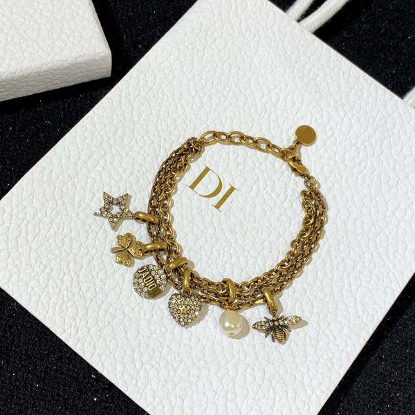 

d multi layer bracelet irregular bee star pendant, White