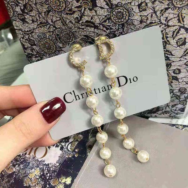 

70% off elegant new pearl earrings, Golden