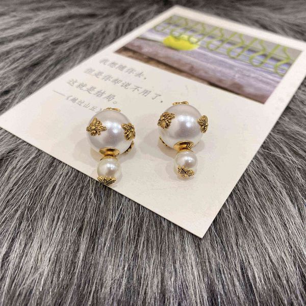 

delivery of brand designer double sided pearl earrings, Golden