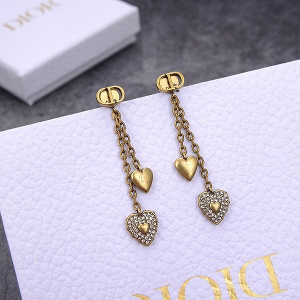 

d family 2021 new heart-shaped asymmetric earrings net red same tassel temperament tide 925 sier needle, Golden
