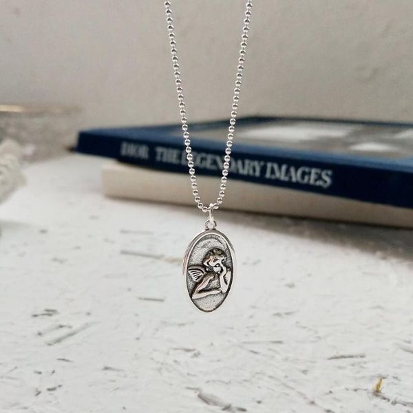 

sterling silver vintage angle pendant necklace necklaces