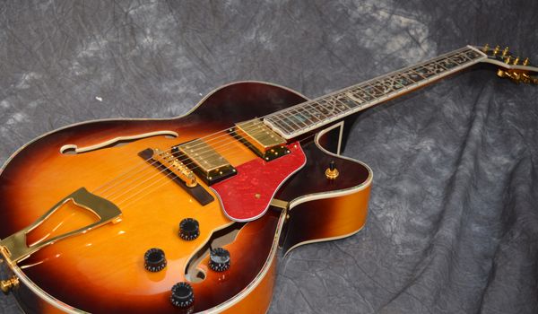 

335 electric guitar semi-hollow body maple golden hardware ,can customize body color binding tree of life inlay