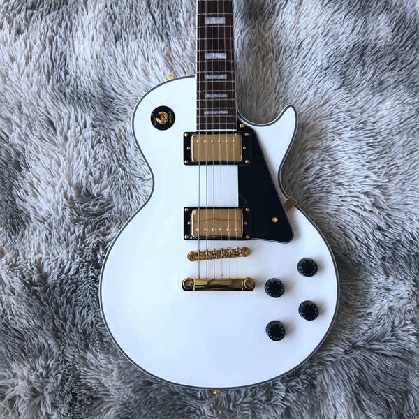 

custom electric guitar with white color and gold hardware make quickly guitarra