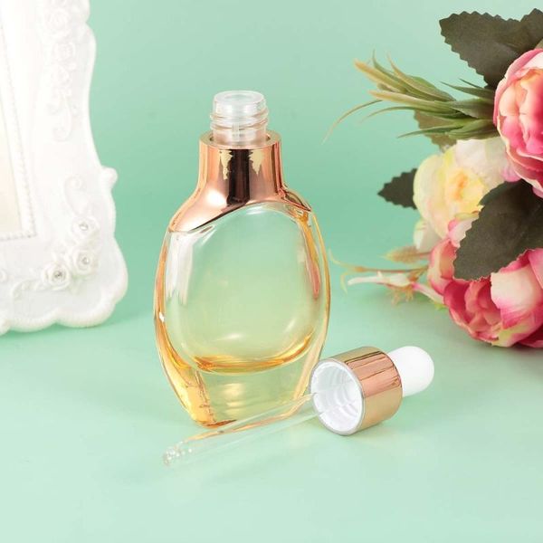 

4pcs refillable essential oil bottles dropper subpackaging glass storage bottle empty (35ml golden dropper) & jars
