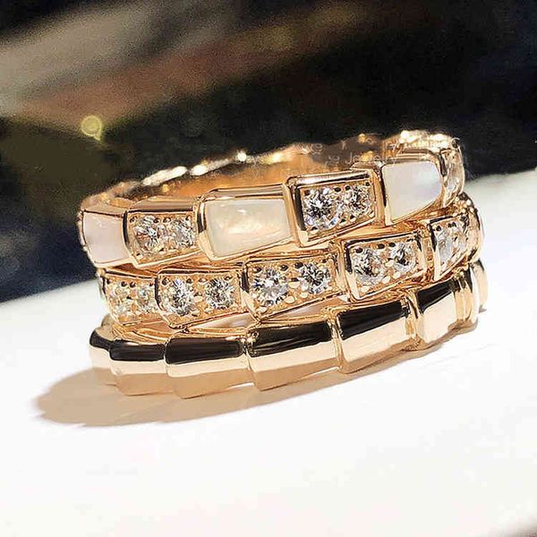 

the new baojia snake bone sterling silver plated color shiny face full diamond rose gold closed mouth narrow ring pair