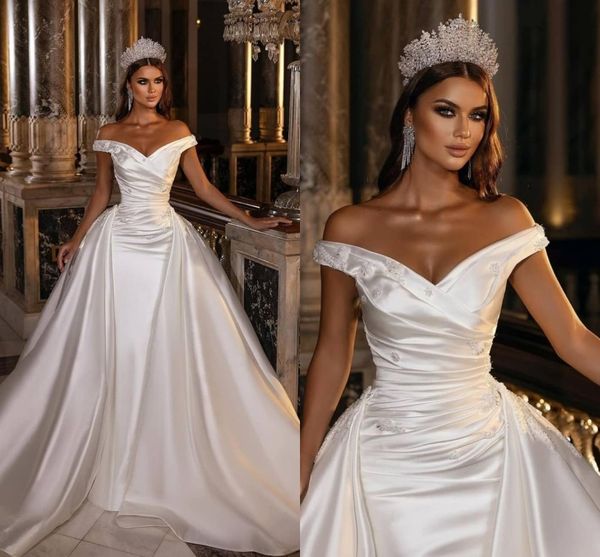 

dubai saudi arabia mermaid wedding gowns with detachable train 2022 simple satin off the shoulder beaded pleats bridal gowns plus size vesti, White