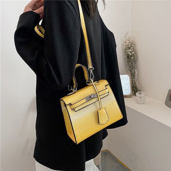 

70% s simple texture kelly new one shoulder slung high capacity gradient handbag