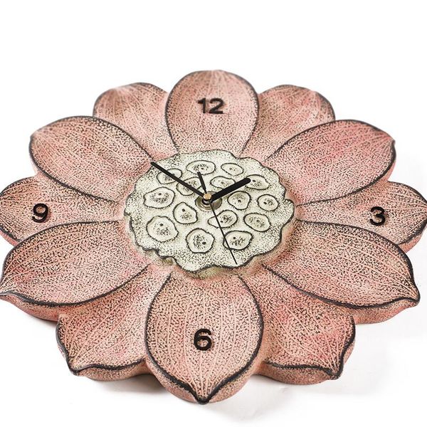 

wall decoration of lotus in living room clocks
