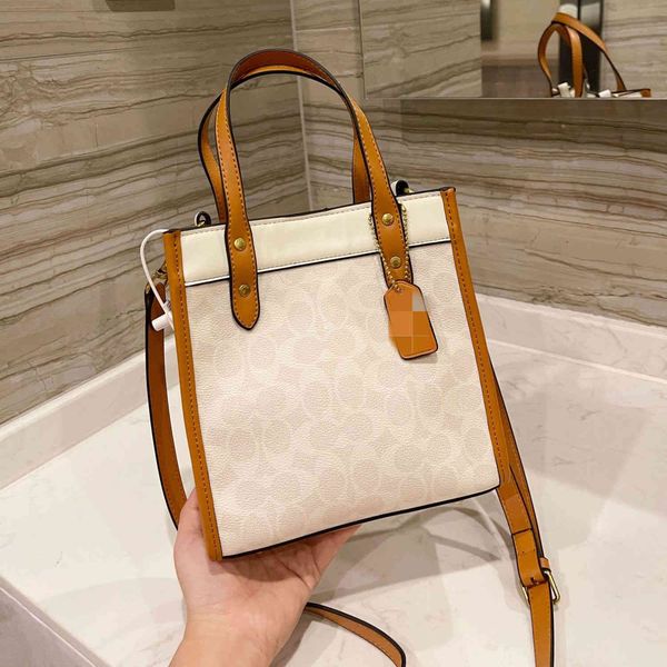 

fashion 2021 new korean women's bag can be slung with one shoulder stitching, cowhide wrist bag, hidden bag and magnetic buckle tote ba