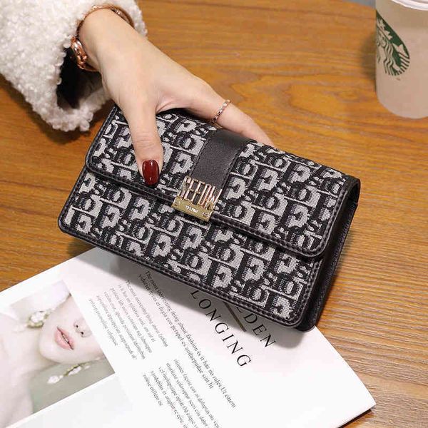

2022 factory wholesale new model bag printing canvas bag leisure versatile chain single shoulder women's mobile phone, Black;red