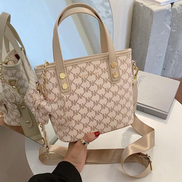 

evening bags 2021 net high-quality texture fashion letter printing portable crossbody western style wild bucket puppy ornaments women bag