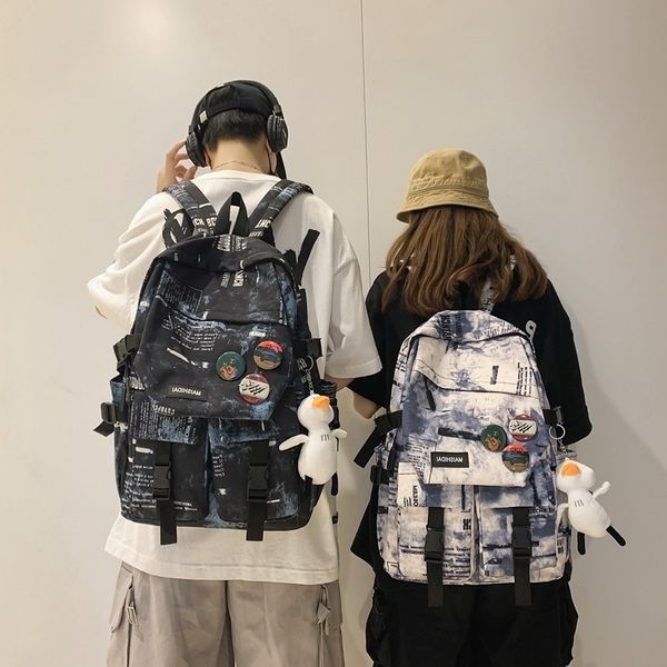 

new korean outdoor backpack design sense graffiti couple fashion cool college student schoolbag female